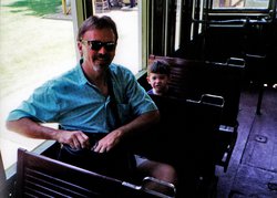 Dad and Christian riding the train
