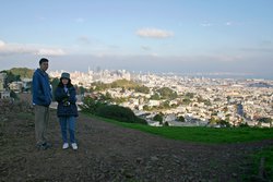 Tab and Tina standing over the city