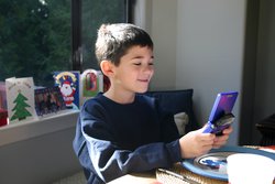 Christian having fun with his Gameboy