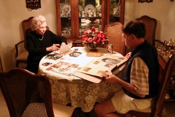 Grandmother and Bill going through old photos