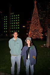 Brother and sister doing the family pose in Union Square