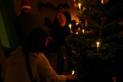 For a bunch of kids going to Berkeley they weren't that smart. They were lighting a real tree with real candles inside an apartment.