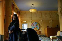 Tina ready to leave in the Hotel Commodore lobby