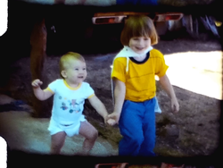 1980-11-16 Jesse and Cody playing Superman, Nate tiny baby (8 mm, 3 inch reel)